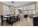 Bright dining room with wooden table, natural light, and neutral paint at 465 Cabral Peak St, Las Vegas, NV 89138