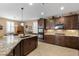 Spacious kitchen with granite counters, stainless appliances, and a breakfast bar at 465 Cabral Peak St, Las Vegas, NV 89138