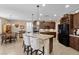 Spacious kitchen with granite counters, stainless appliances, and a breakfast bar at 465 Cabral Peak St, Las Vegas, NV 89138