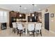 Spacious kitchen with granite counters, stainless appliances, and a breakfast bar at 465 Cabral Peak St, Las Vegas, NV 89138