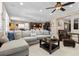 Comfortable living room with neutral décor, plush seating, and abundant natural light, great for relaxation at 465 Cabral Peak St, Las Vegas, NV 89138