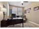 Cozy home office includes a large desk, comfortable chair, and natural light perfect for productivity at 465 Cabral Peak St, Las Vegas, NV 89138
