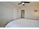 Neutral bedroom featuring large closet, a ceiling fan, and neutral tones at 4833 Straight Flush Dr # 103, Las Vegas, NV 89122