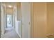 Neutral hallway with access to bedrooms at 4833 Straight Flush Dr # 103, Las Vegas, NV 89122