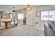 Inviting living room featuring tile floors, natural light and dining area at 4833 Straight Flush Dr # 103, Las Vegas, NV 89122