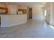 Open-concept living area with neutral paint, tile flooring and lots of natural light at 4833 Straight Flush Dr # 103, Las Vegas, NV 89122