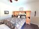 Comfortable bedroom with wood floors and a decorative headboard at 5104 Burr Oak Dr, Las Vegas, NV 89130