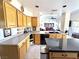Bright kitchen with stainless steel appliances and an open concept living space at 5104 Burr Oak Dr, Las Vegas, NV 89130