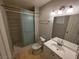 A modern bathroom with a glass-enclosed shower and updated vanity at 5440 Swenson St # 18, Las Vegas, NV 89119