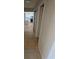Hallway leading into the kitchen with tile flooring at 5440 Swenson St # 18, Las Vegas, NV 89119