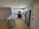 The kitchen features stainless steel appliances, white cabinets, and a granite countertop at 5440 Swenson St # 18, Las Vegas, NV 89119