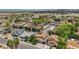 Sprawling aerial view of a suburban neighborhood with diverse homes and tree-lined streets, offering a sense of community at 601 Cragin Park Dr, Las Vegas, NV 89107