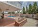 Outdoor oasis featuring a pool, covered patio, landscaping, and space for entertaining at 601 Cragin Park Dr, Las Vegas, NV 89107