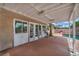Charming covered patio offers ample shade and views of the backyard pool at 601 Cragin Park Dr, Las Vegas, NV 89107