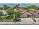 Charming two-story home with well-maintained lawn, mature trees, and an attached two-car garage at 601 Cragin Park Dr, Las Vegas, NV 89107
