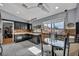 Kitchen with black cabinets, laminate countertops, tile floors and a glass kitchen table at 601 Cragin Park Dr, Las Vegas, NV 89107