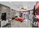 Spacious main bedroom with stylish gray accent wall and door to balcony at 601 Cragin Park Dr, Las Vegas, NV 89107