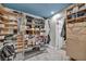 Walk-in closet featuring custom shelving, hanging racks, and organization solutions at 601 Cragin Park Dr, Las Vegas, NV 89107