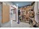 Bright walk-in closet with custom shelving and organization, plus access to balcony at 601 Cragin Park Dr, Las Vegas, NV 89107