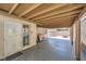 Covered patio with concrete floor and wooden support beams at 601 Ordrich Pl, Las Vegas, NV 89145