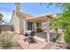 Backyard patio featuring a covered area, barbecue, and exterior access at 610 Playa Del Sol Way, Henderson, NV 89015