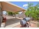 Backyard patio featuring a covered area, barbecue, and exterior access at 610 Playa Del Sol Way, Henderson, NV 89015