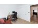 Bedroom featuring a desk, sofa, and sliding closet doors at 610 Playa Del Sol Way, Henderson, NV 89015