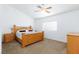 Bedroom showcasing a wooden bed frame, carpeted floor and neutral colored walls at 610 Playa Del Sol Way, Henderson, NV 89015