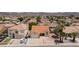 Charming single-Gathering home showcasing a well-manicured lawn and mature palm trees at 610 Playa Del Sol Way, Henderson, NV 89015