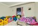 bedroom with colorful decor, bright rug and playful accents at 613 Stanford St, Las Vegas, NV 89107