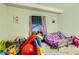 bedroom with colorful decor, bright rug and playful accents at 613 Stanford St, Las Vegas, NV 89107