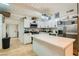 Well-equipped kitchen with white cabinets, stainless steel appliances, and a bright, open layout at 613 Stanford St, Las Vegas, NV 89107
