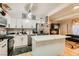 Contemporary kitchen featuring stainless steel appliances, white cabinetry, and a functional island at 613 Stanford St, Las Vegas, NV 89107