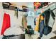 Walk-in closet with shelving, clothes, and a window for natural light at 613 Stanford St, Las Vegas, NV 89107