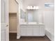 Bathroom boasting double vanity, large mirror, and shower/tub at 6140 Passionate Ct, North Las Vegas, NV 89031