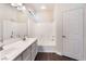 Bathroom featuring double sinks, modern fixtures and walk in shower/tub at 6140 Passionate Ct, North Las Vegas, NV 89031