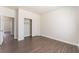Bedroom showcasing wood-look floors, walk-in closet and light-filled space at 6140 Passionate Ct, North Las Vegas, NV 89031