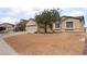 Single-story house boasting low-maintenance landscaping and an attached two-car garage in a neighborhood at 6140 Passionate Ct, North Las Vegas, NV 89031