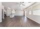 Open-concept living area with modern finishes, laminate floors, and stainless steel appliances at 6140 Passionate Ct, North Las Vegas, NV 89031