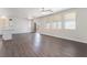 Spacious living room area with recessed lighting, ceiling fan and laminate flooring throughout at 6140 Passionate Ct, North Las Vegas, NV 89031