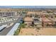 Neighborhood aerial view showcasing well-maintained homes with desert landscaping in an organized community at 6247 Sugartree Ave, Las Vegas, NV 89141
