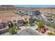 The aerial view showcases the community layout, including residential buildings, streets, and surrounding landscape at 6247 Sugartree Ave, Las Vegas, NV 89141