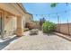 A backyard has a paved patio with a seating area, perfect for outdoor relaxation and entertaining at 6247 Sugartree Ave, Las Vegas, NV 89141