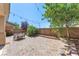 A backyard has a paved patio with a seating area, perfect for outdoor relaxation and entertaining at 6247 Sugartree Ave, Las Vegas, NV 89141