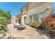 A backyard has a paved patio with a seating area, perfect for outdoor relaxation and entertaining at 6247 Sugartree Ave, Las Vegas, NV 89141