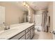 Bathroom featuring white countertops and cabinet and shower/tub at 625 Loyalty Ct, Henderson, NV 89011