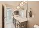 Bathroom featuring large vanity, lots of lighting and mirror at 625 Loyalty Ct, Henderson, NV 89011
