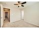 Bedroom features carpet flooring, a ceiling fan and neutral walls at 625 Loyalty Ct, Henderson, NV 89011