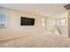 Large bonus room with a TV and multiple windows for natural light at 625 Loyalty Ct, Henderson, NV 89011