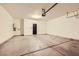 Spacious garage with concrete flooring and an automatic door opener at 625 Loyalty Ct, Henderson, NV 89011
